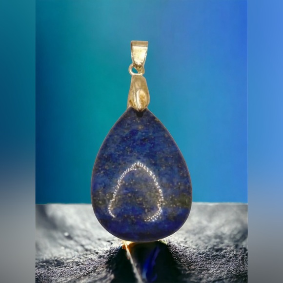 Lapis lazuli gemstone teardrop pendant. Pendant measures 1 3/4” long x 3/4” wide - Picture 1 of 2